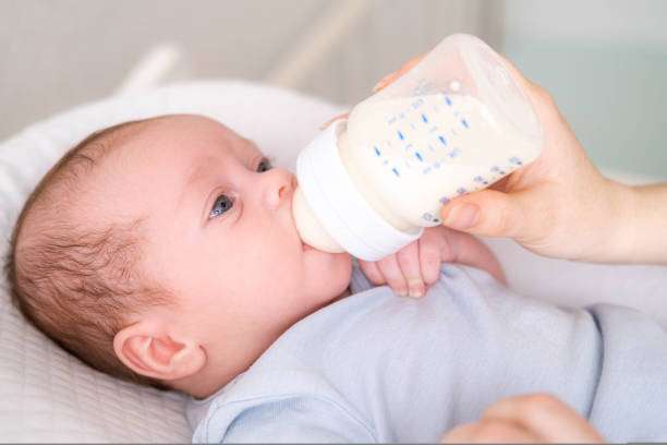 baby girl smile, bottle warmer